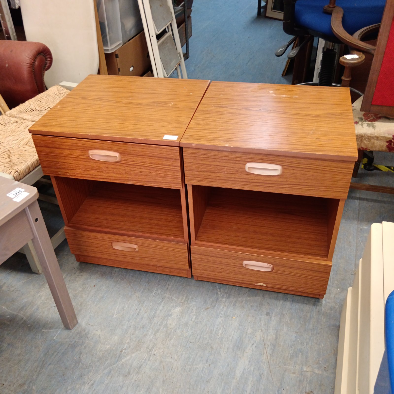 Pair of retro bedside cabinets with wood finish.