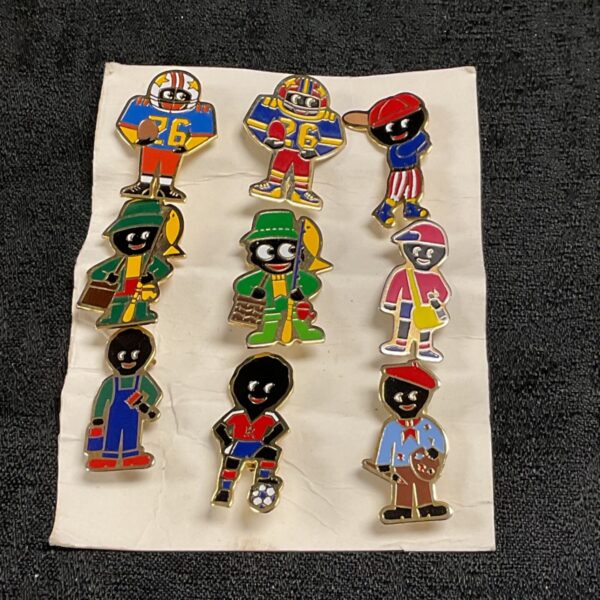 Vintage Robertson Golly badges collection featuring various sports.