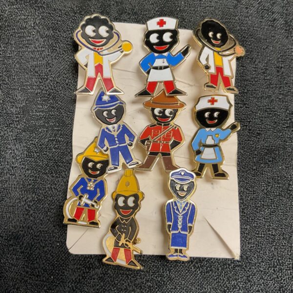 Vintage Robertson Golly badges depicting emergency services workers.