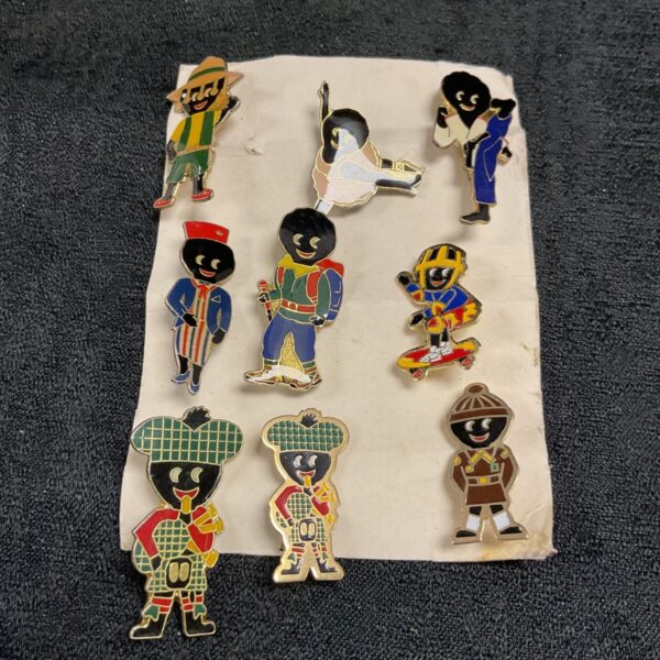 Vintage Robertson Golly badges collection, enamel pin badges for collectors.