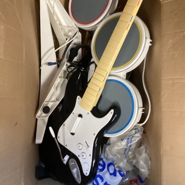 Rock Band drum kit and guitar set for music gaming.