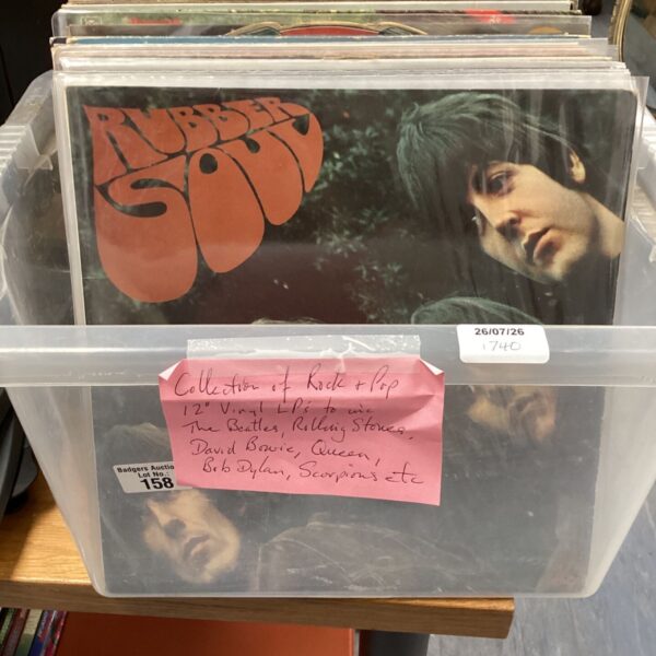 Collection of vintage rock and pop vinyl records including The Beatles.