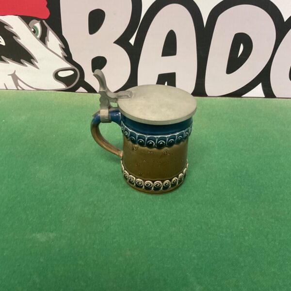 Vintage Rosenthal beer tankard with a detailed hunting scene relief.
