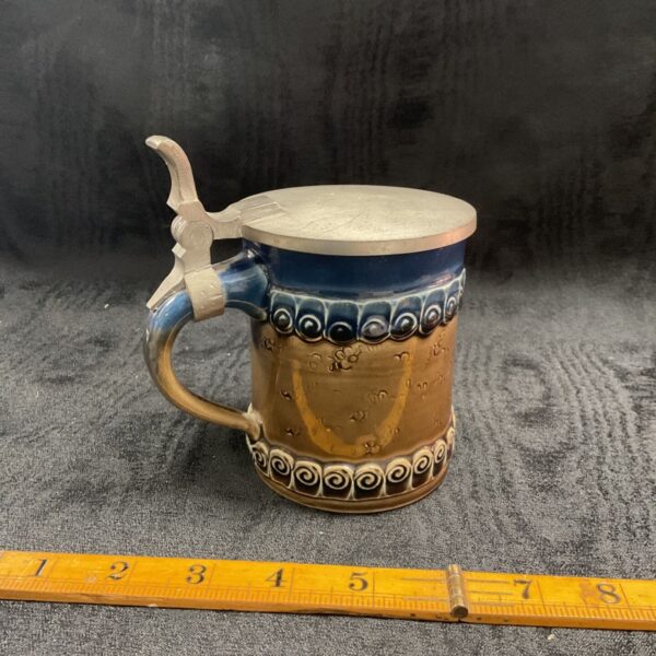 Vintage Rosenthal ceramic tankard with pewter lid, side view.