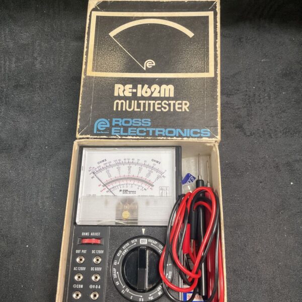 Vintage Ross Electronics RE-162M multitester with red and black leads.