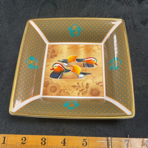 Royal Worcester Kyoto dish with Mandrin duck design and gold accents.