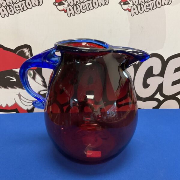 Stunning ruby and cobalt blue hand blown art glass jug.