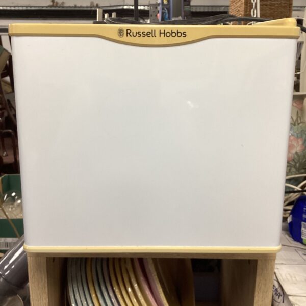 Russell Hobbs mini fridge in used condition, compact countertop appliance.