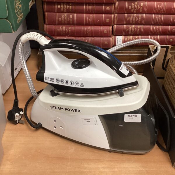 Vintage Russell Hobbs steam iron for garment care.