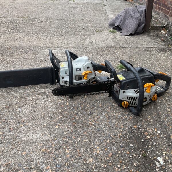 Ryobi chainsaw, a petrol powered garden tool in used condition.