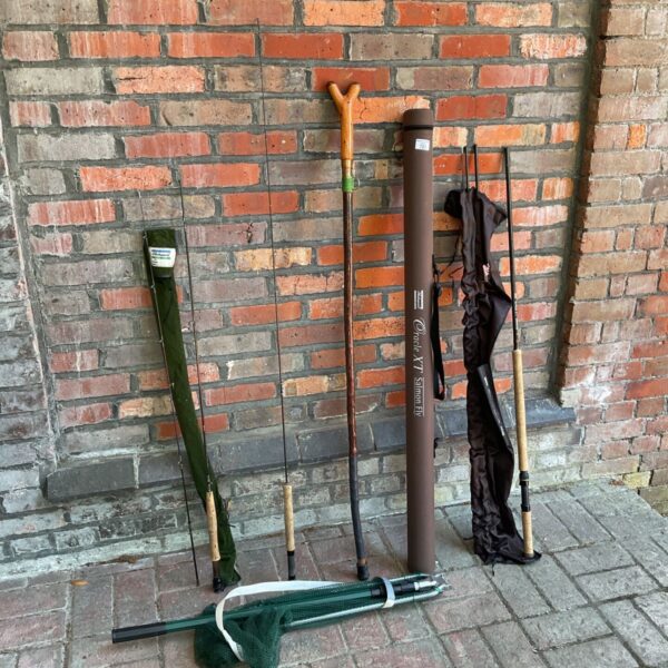Vintage salmon fishing rods, trout net and wading stick lot.