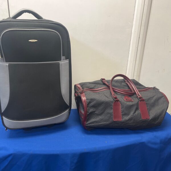 Samsonite luggage set featuring a wheeled suitcase and duffel bag.