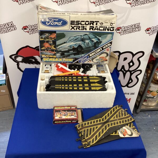 Vintage Scalextric Ford Escort XR3i racing set in original box.