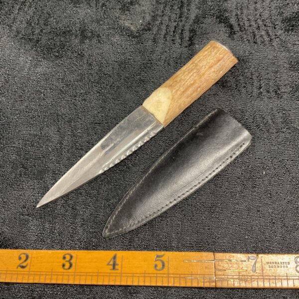 Antique Scottish Sgian Dubh with staghorn handle and leather sheath.