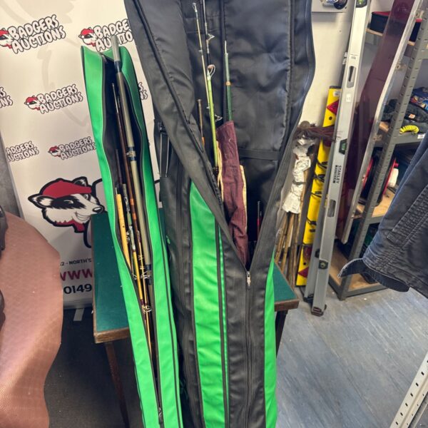 Sensas fishing rod bags containing assorted fishing rods and tackle.