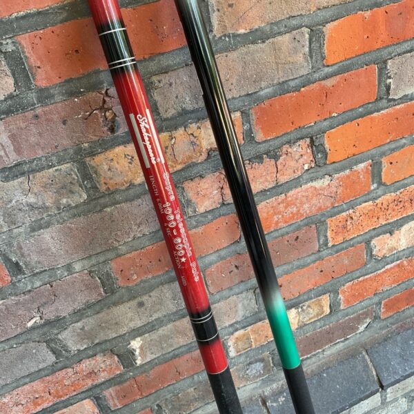 Shakespeare Supra 10m telescopic fishing pole in red and black.