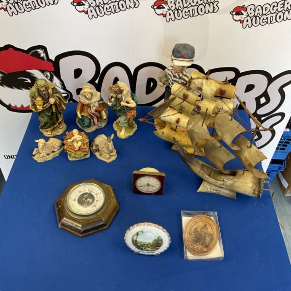 Selection of vintage ship ornaments and a figure, including horn ships.