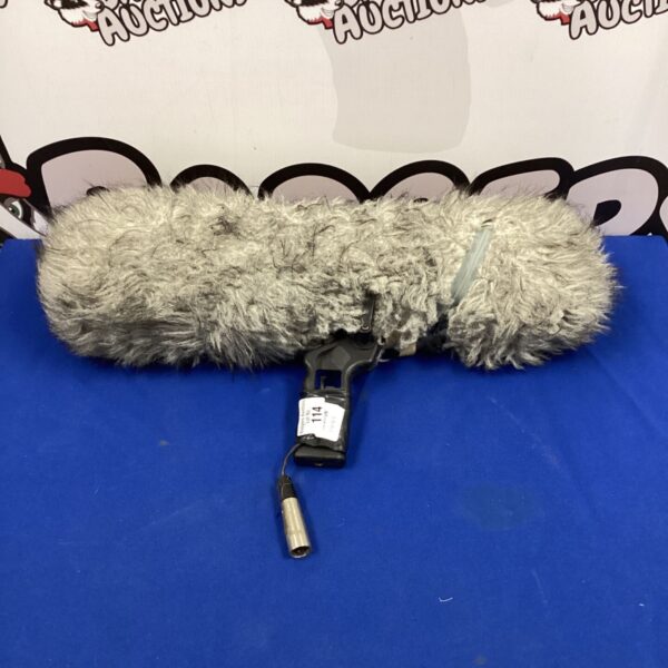 Shotgun microphone blimp system with furry windjammer cover.