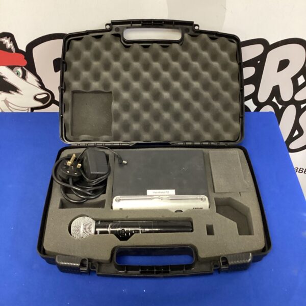Shure SM58 wireless microphone kit in a hard case.