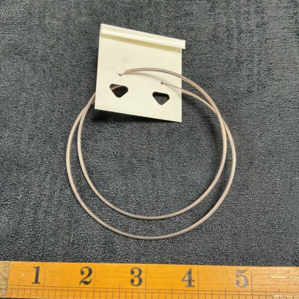 Pair of large 925 silver hoop earrings on a neutral background.
