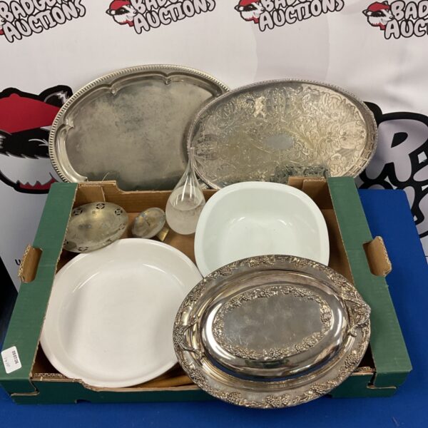 Collection of antique silver plate trays and a green dish.