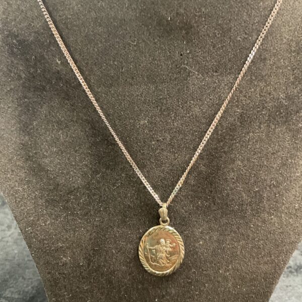 Vintage silver St Christopher pendant on a 20 inch chain.