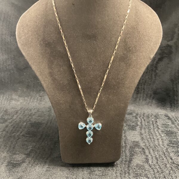 Vintage silver topaz cross pendant on 18 inch necklace.