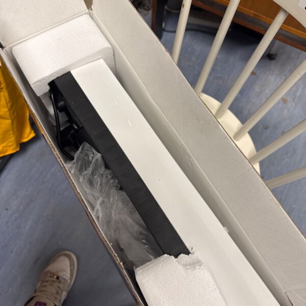Smart heating unit in original packaging with protective foam.