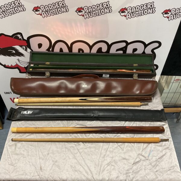Vintage snooker cue collection in a fitted case.