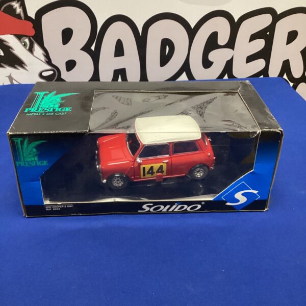 Red Solido Mini Cooper S 1964 diecast model car.