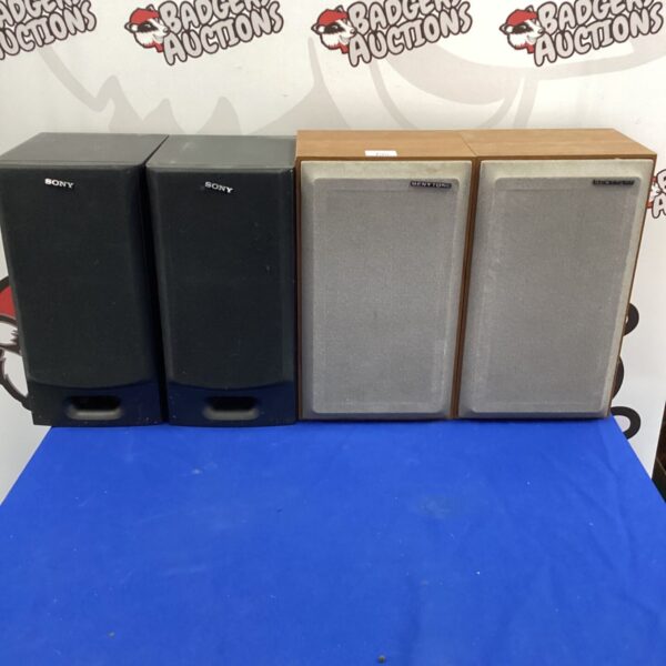 Vintage Sony and Benytone speaker pair for home audio.