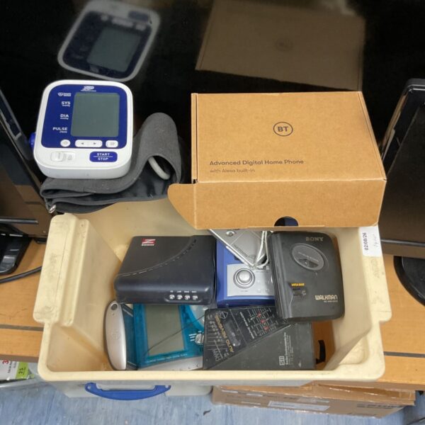 Vintage Sony WM-DDII Walkman cassette player with accessories.