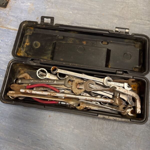 Vintage spanner set in a grey plastic case.