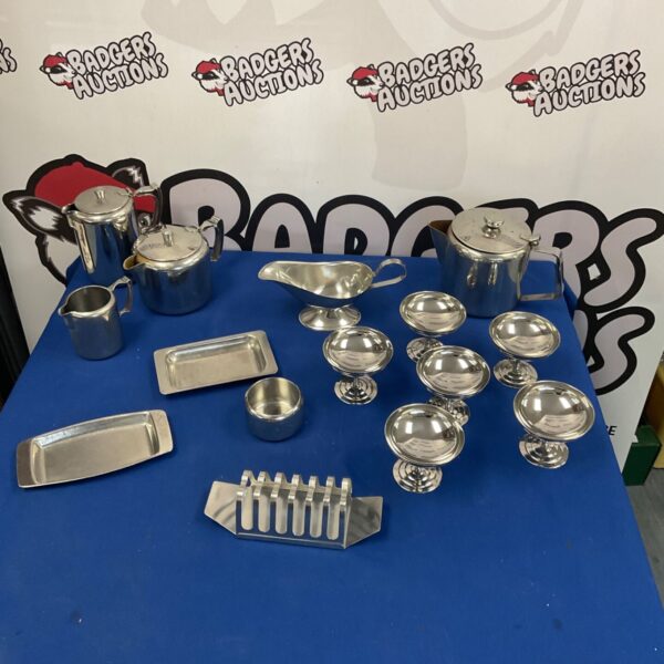 Stainless steel breakfast set with coffee and tea pots.