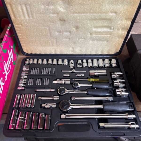 Open Stanley ratchet and socket set showing tools inside case.