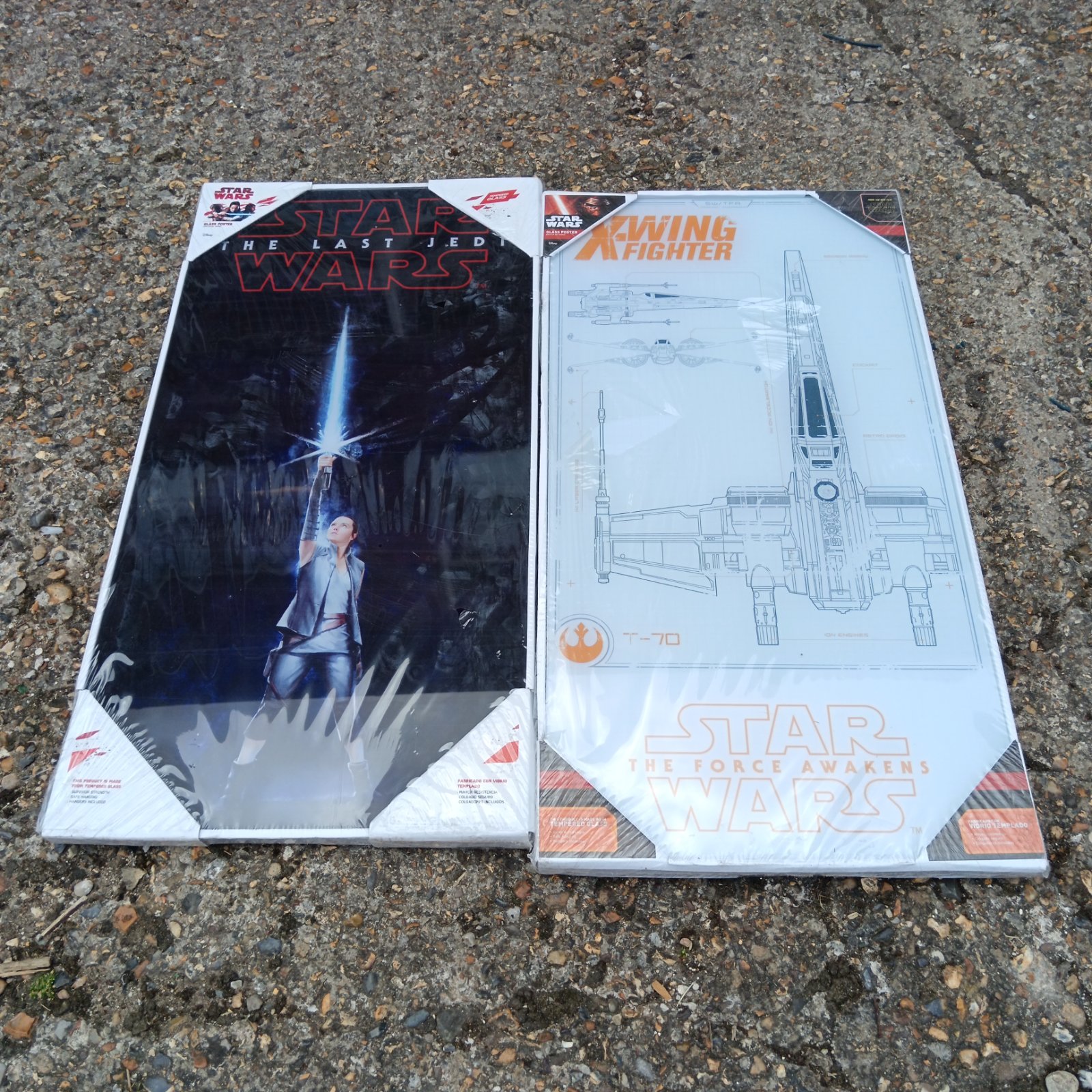 Star Wars prints in original packaging, collectible wall art.