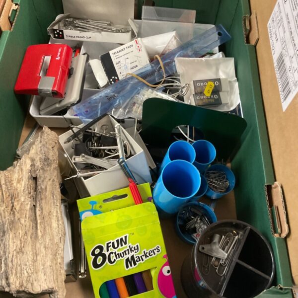 Tray of mixed stationery and office supplies.
