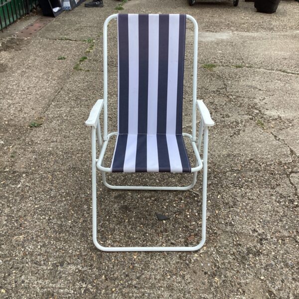 Striped garden lounge chair, folded and ready for outdoor use.