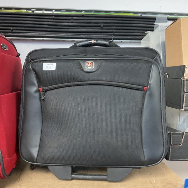 Black SwissGear laptop travel case with wheels and handle.