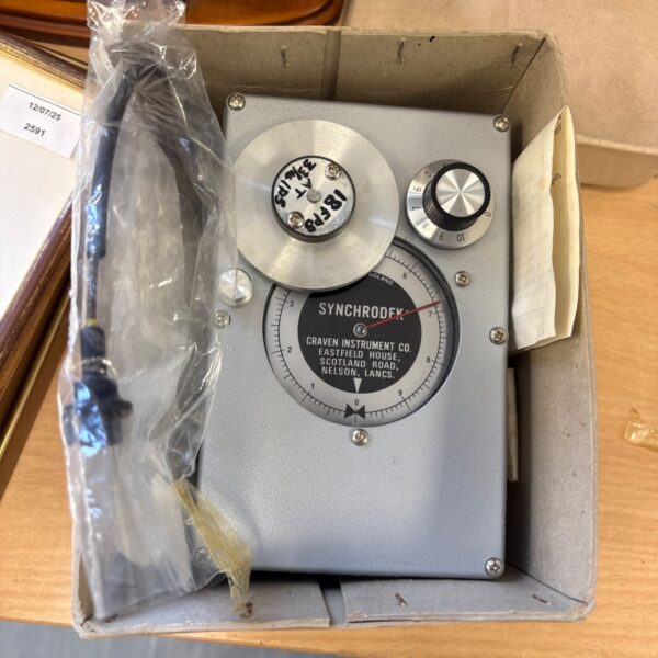 Vintage Synchrodek film synchroniser with speed dial visible.