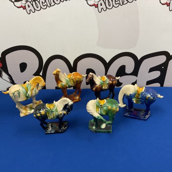 Set of six Tang Dynasty style ceramic war horses with colourful glaze.