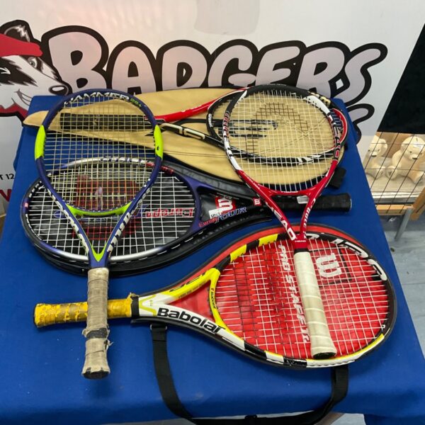 Selection of used tennis rackets including Wilson and Babolat brands.