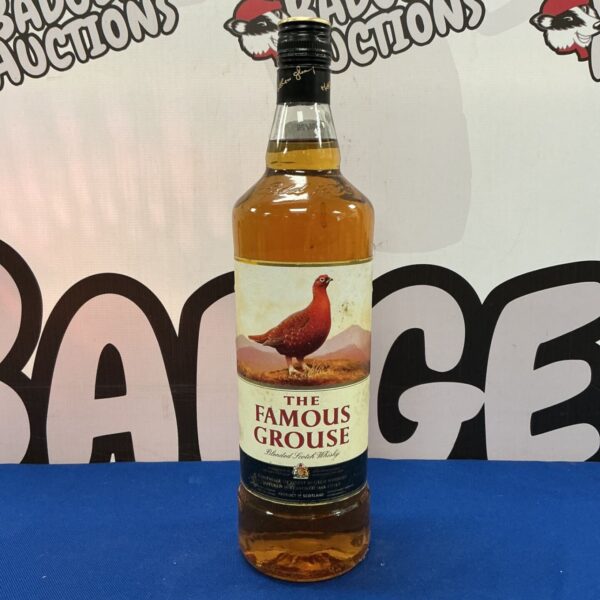 The Famous Grouse blended Scotch whiskey bottle with label.