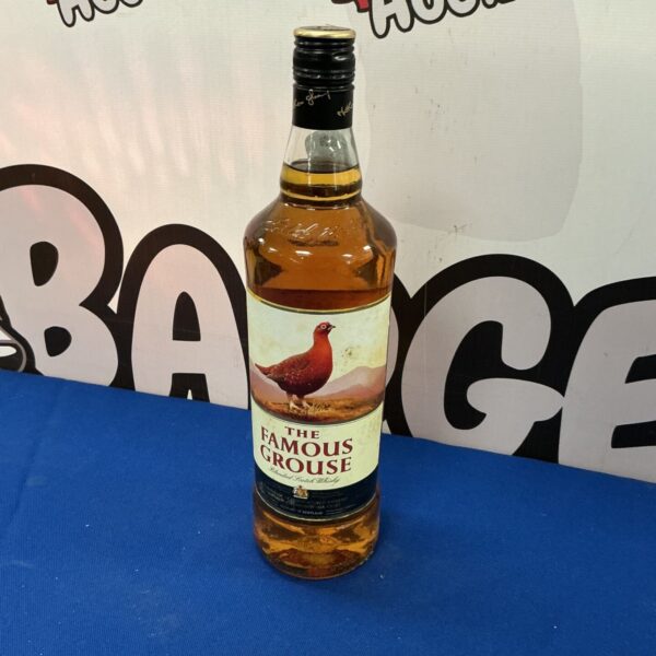 Bottle of The Famous Grouse blended Scotch whiskey for sale.