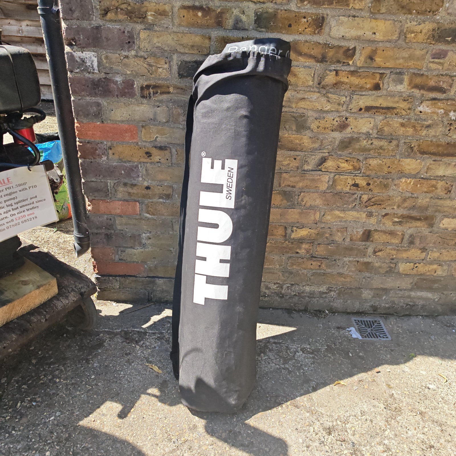 Thule Ranger 90 roof bag, a used car roof storage solution.