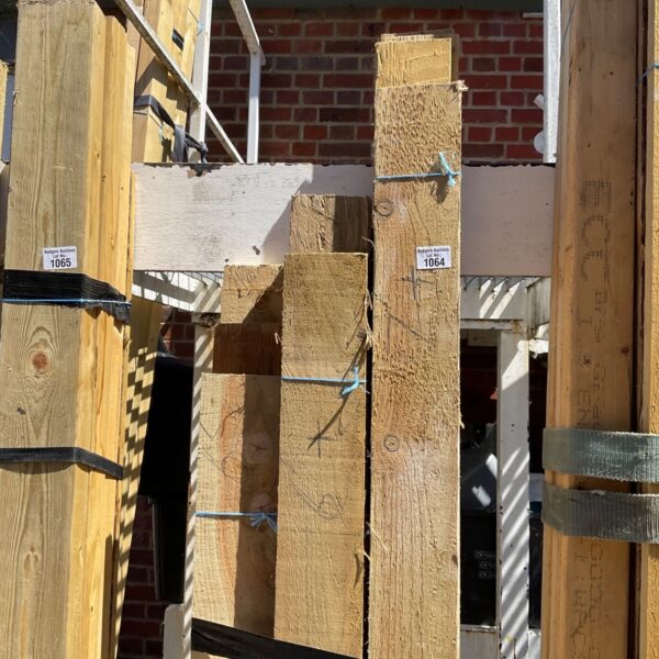 Stacked timber bundles for construction and DIY projects.