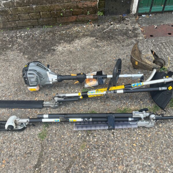 Titan 25.4cc multi-tool with attachments for garden landscaping.
