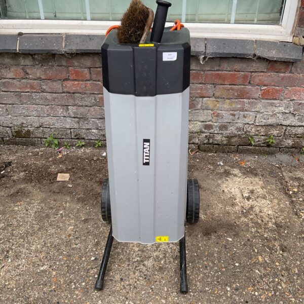 Titan garden shredder with wheeled base for easy garden waste disposal.