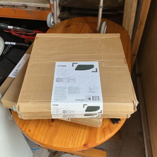 Two Tivano 15kg parasol bases stacked for storage.