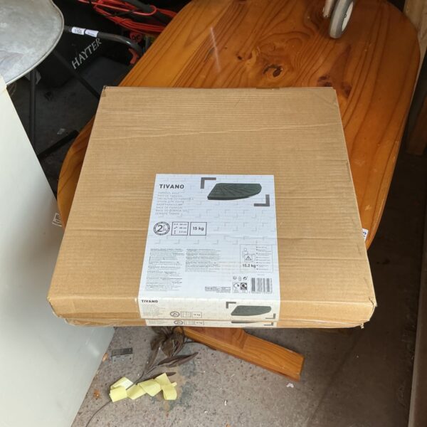 Pair of Tivano parasol bases for garden stability.
